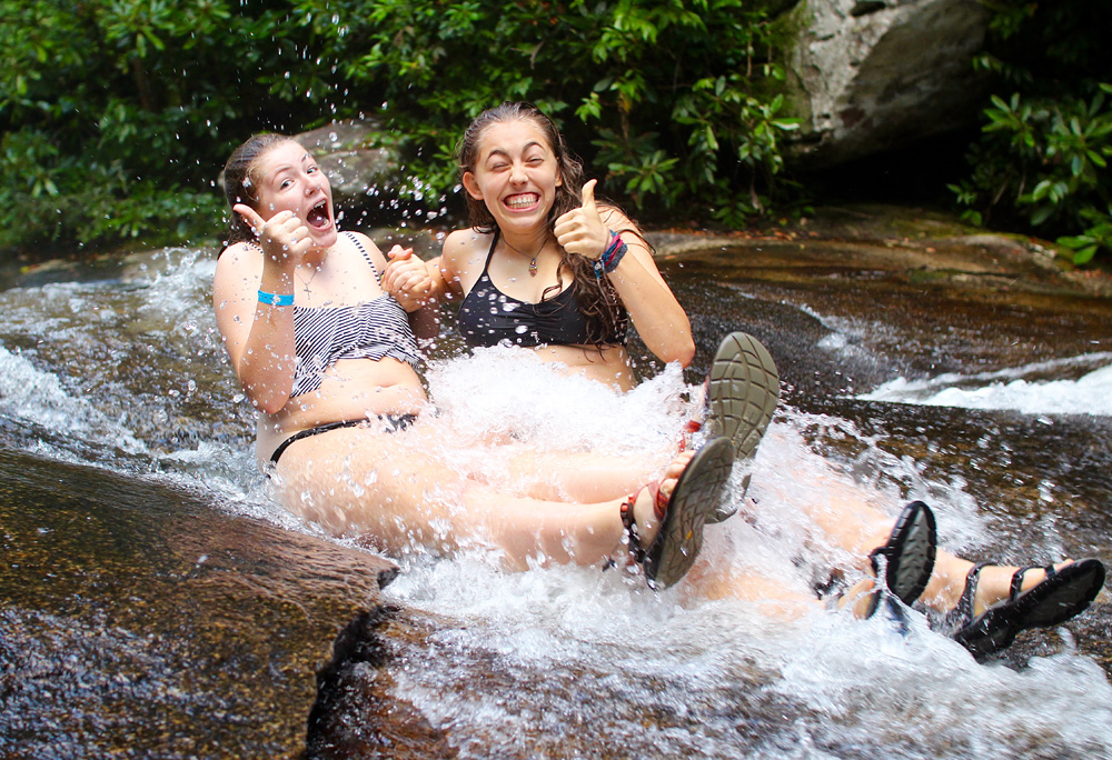 Sliding Rock Thumbs Up Girls