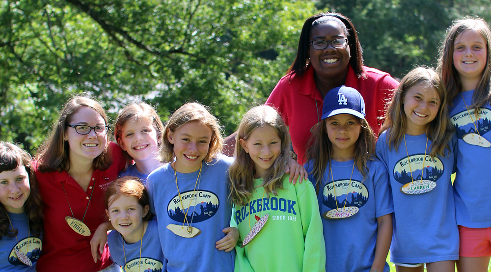 Girls arrive at summer camp