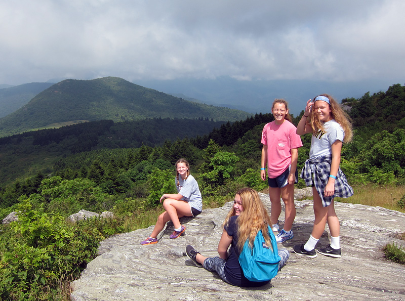 Girls mountain top hiking