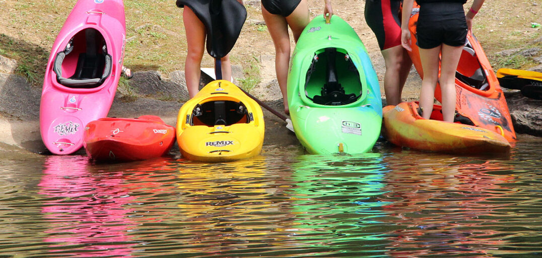 colorful camp kayaks
