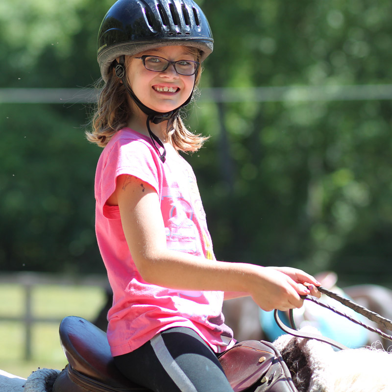 Girl Horseback Riding