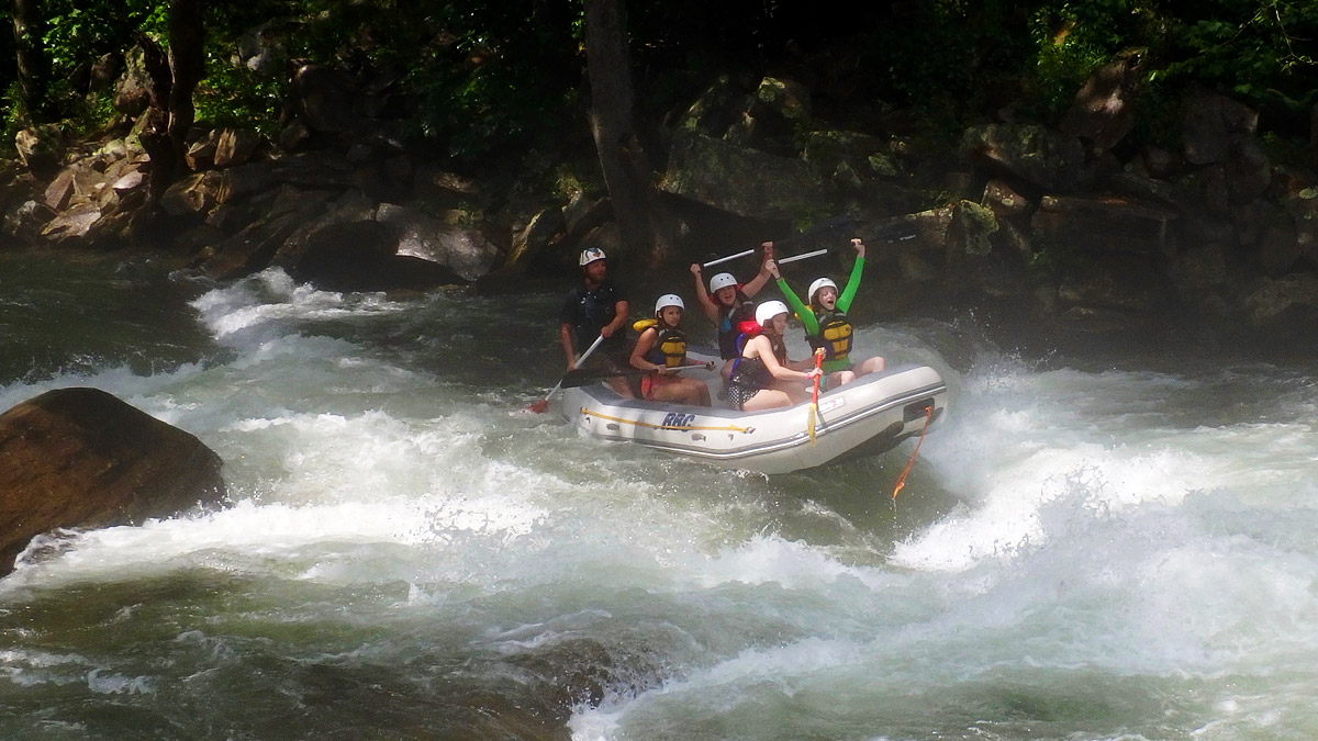 Rafting Celebration in a Rapid