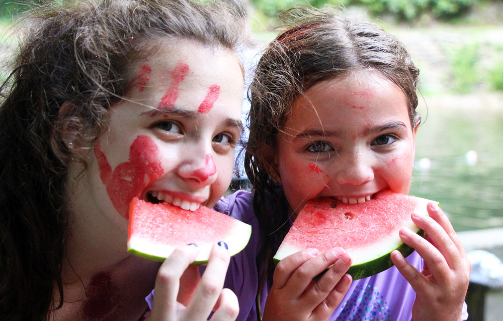 Girls eating watermelon