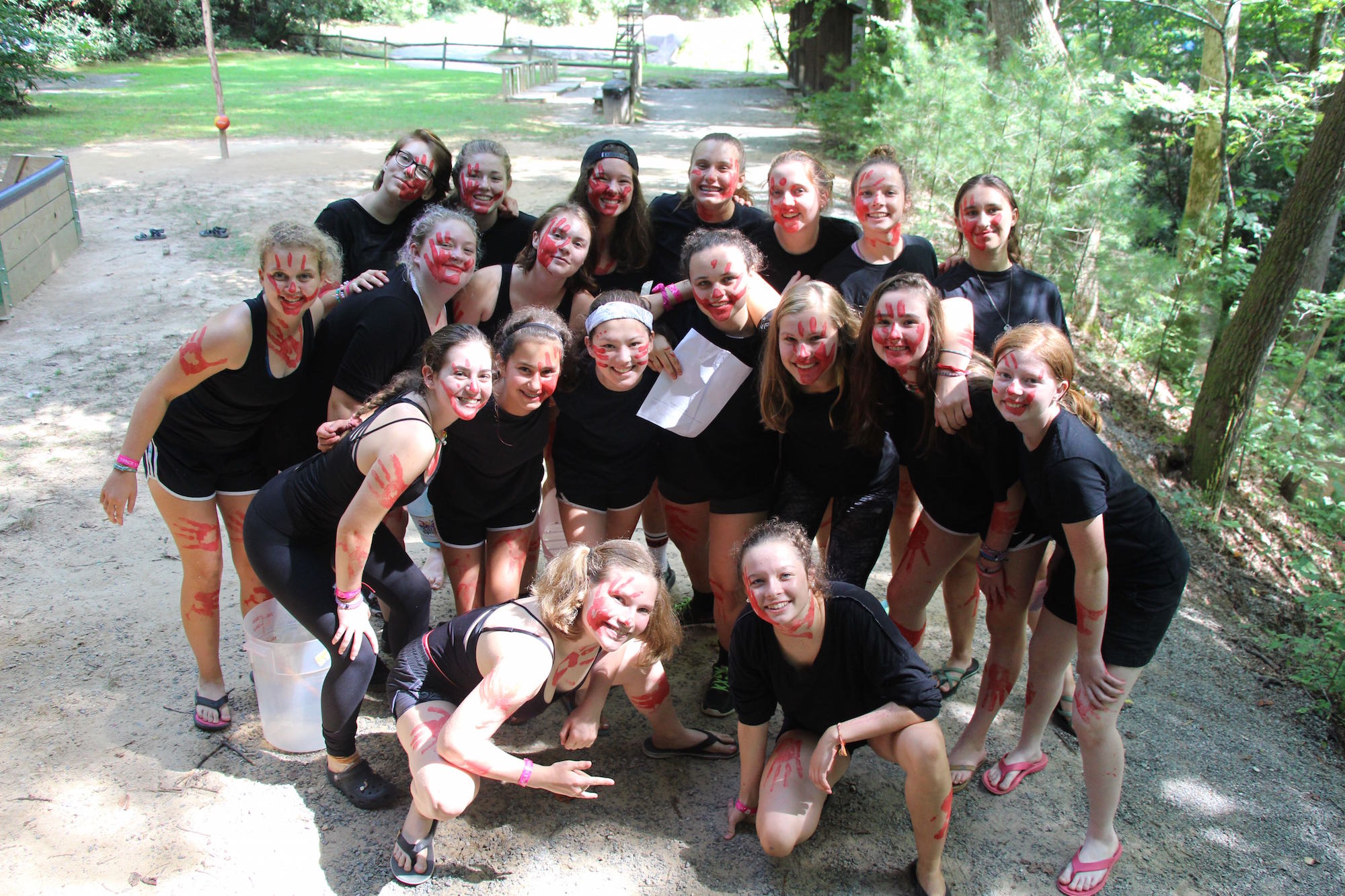 group of camp girls dressed in black