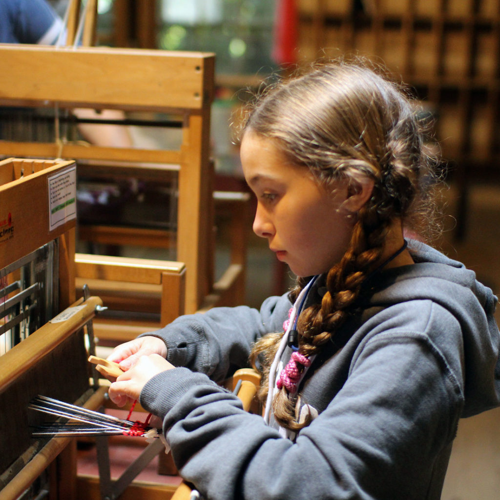 Girl Weaving