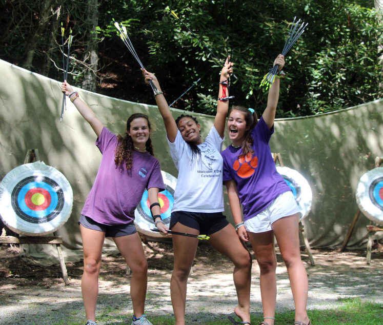 archery camp girls posing