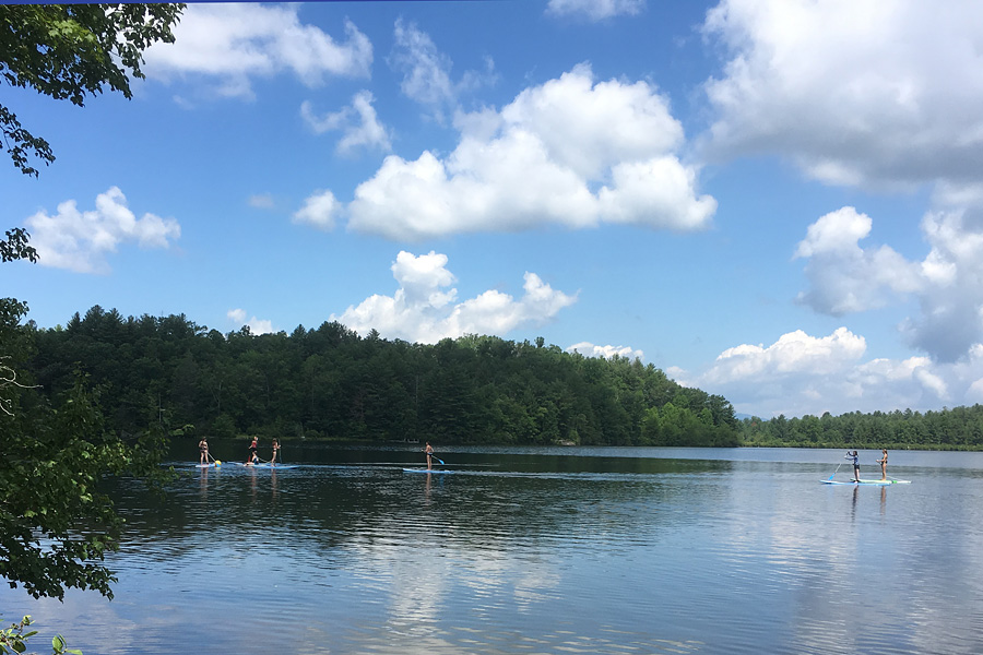 mountain lake paddleboarding