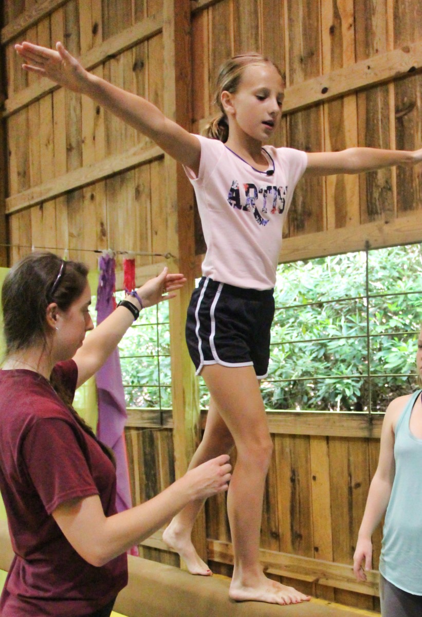 gymnastics girl on balance beam