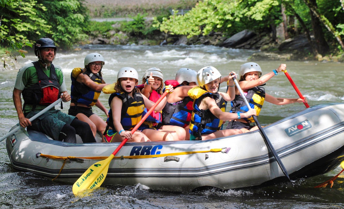 Camp crew whitewater rafting