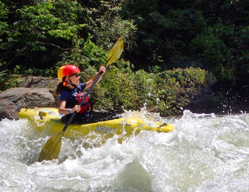 small girl kayaking