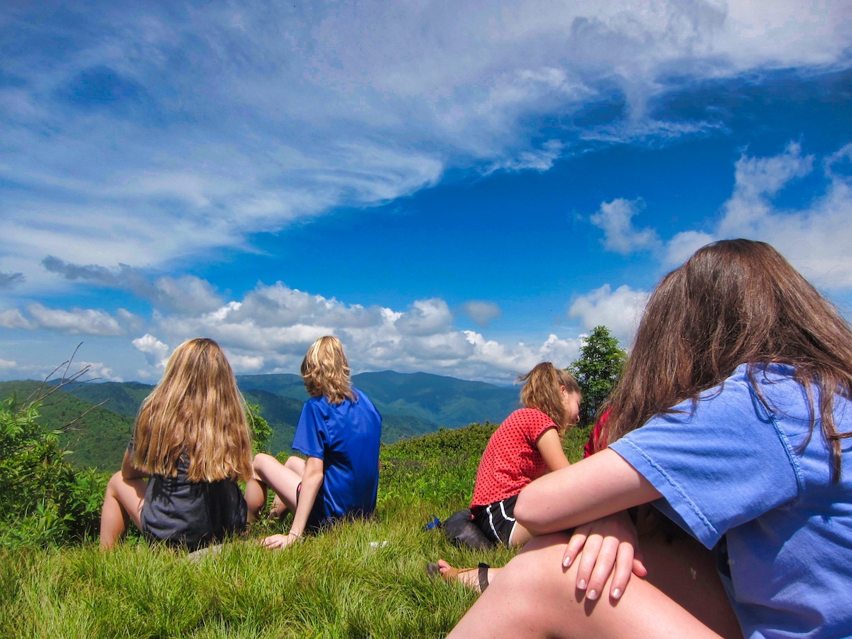 camp teens on mountain