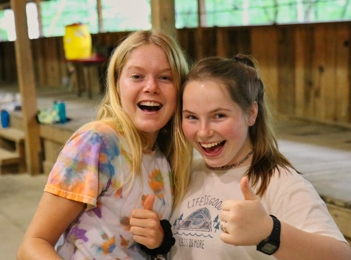 Camp friends thumbs up