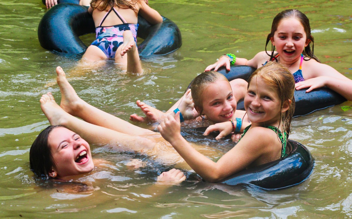 kids goofing around at the camp lake