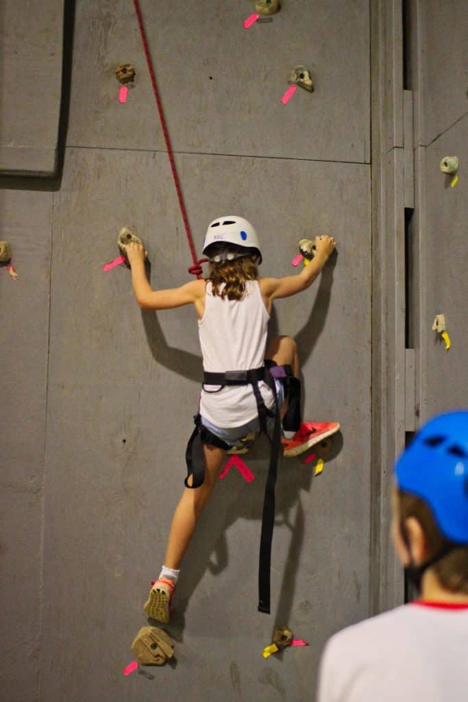 Climbing wall girl