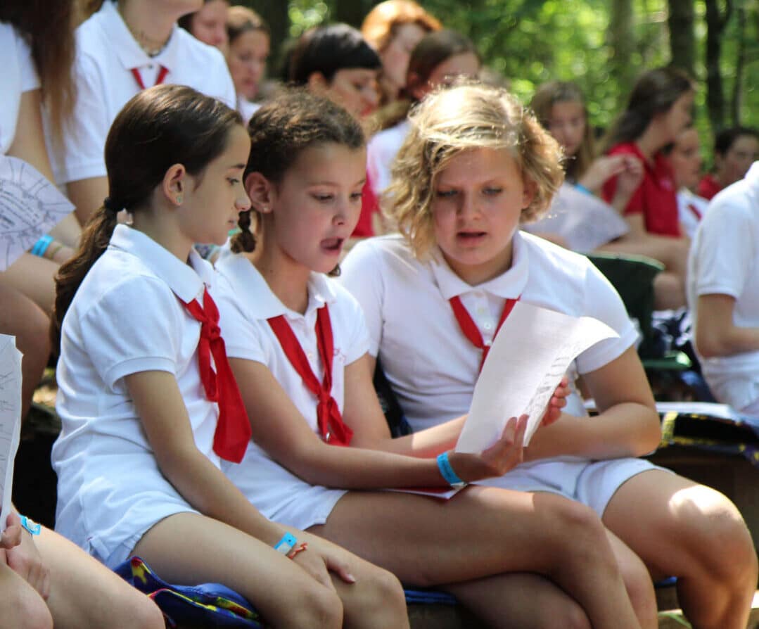 girls singing song camp