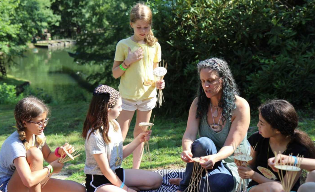 teaching weaving by the creek