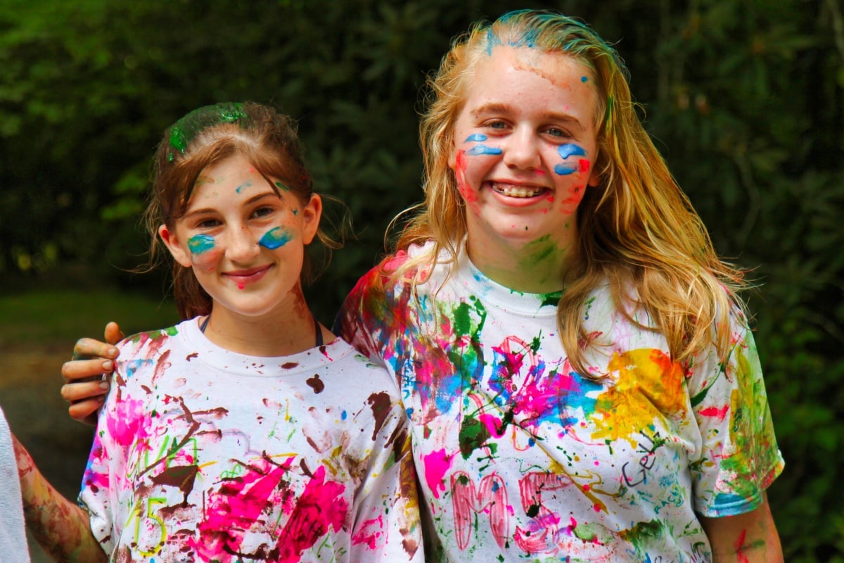 girls wearing t-shirts painted at camp