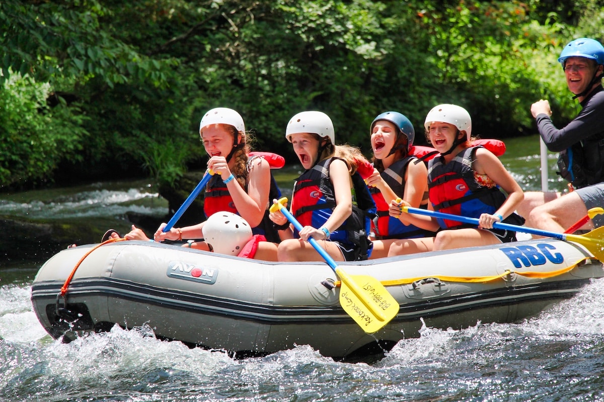 Girls Laughing in whitewater raft