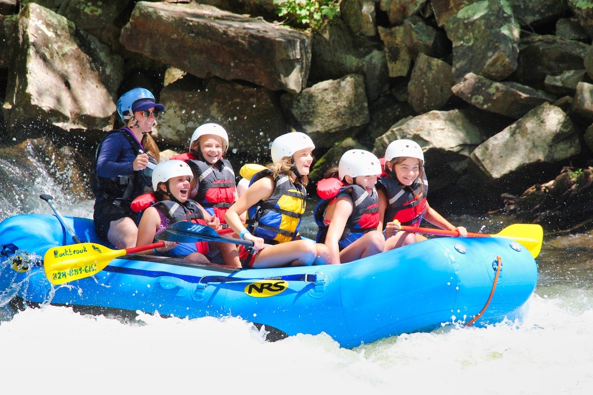 happy girl camp rafting