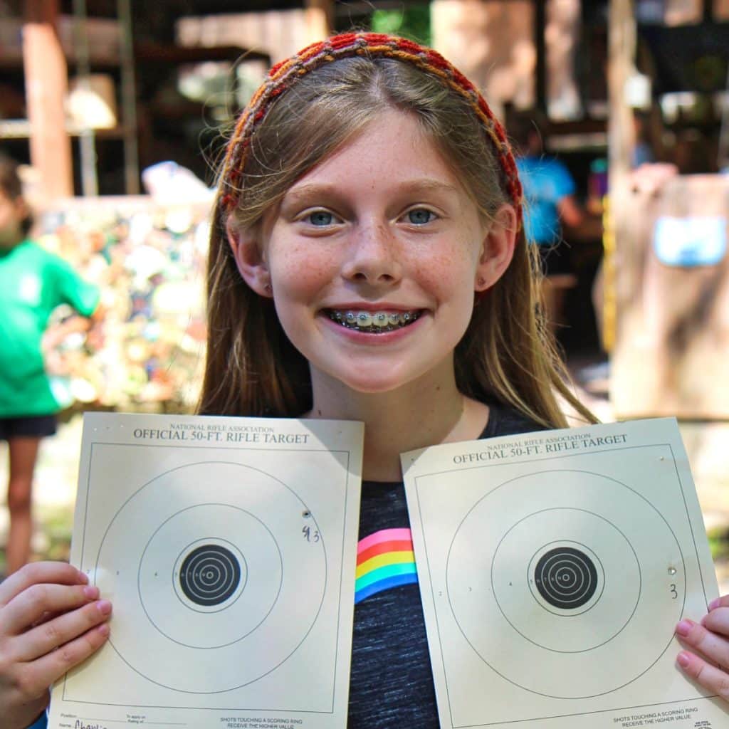 target shooter kid at camp