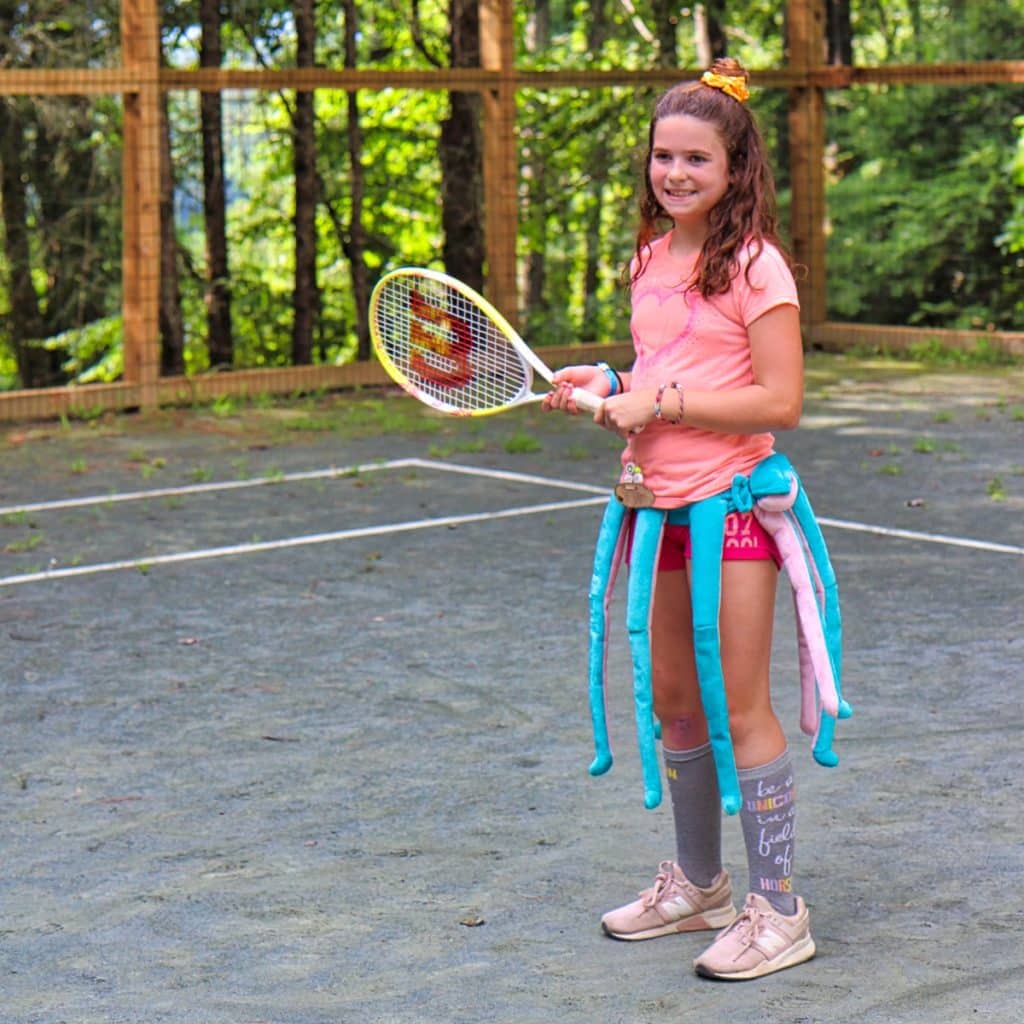 girl wearing tennis costume
