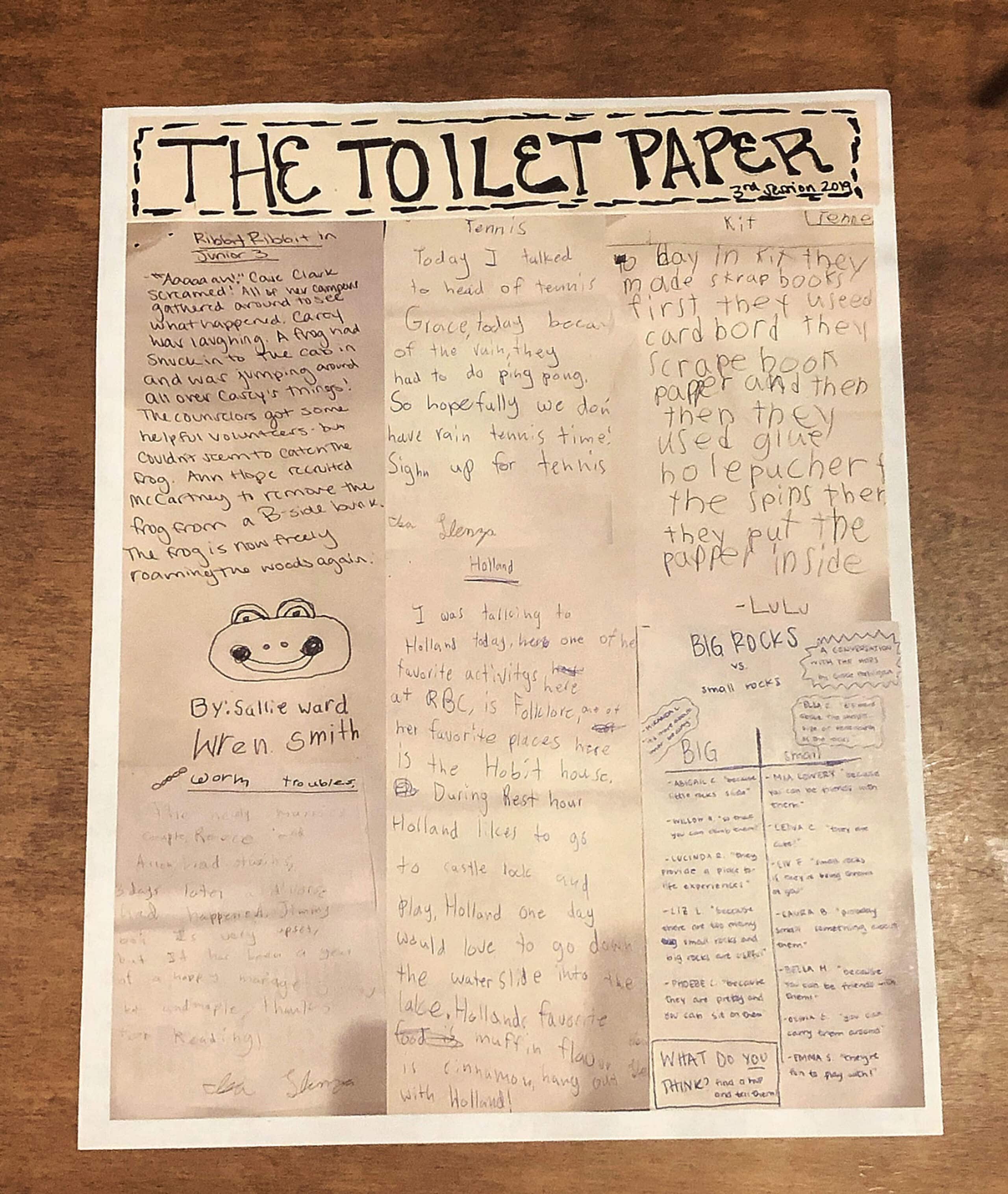 camp newspaper with drawings