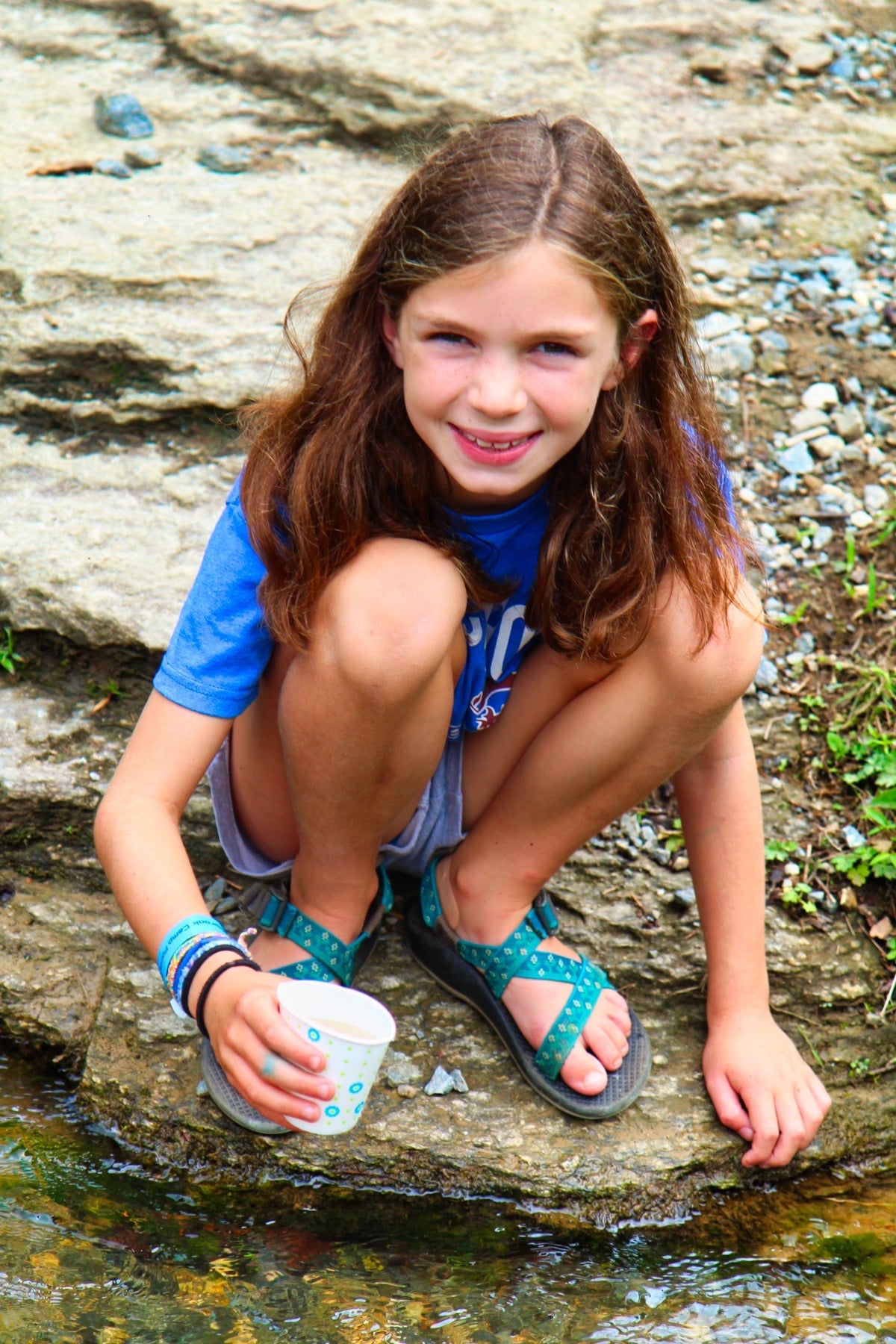 catching tadpoles at summer camp