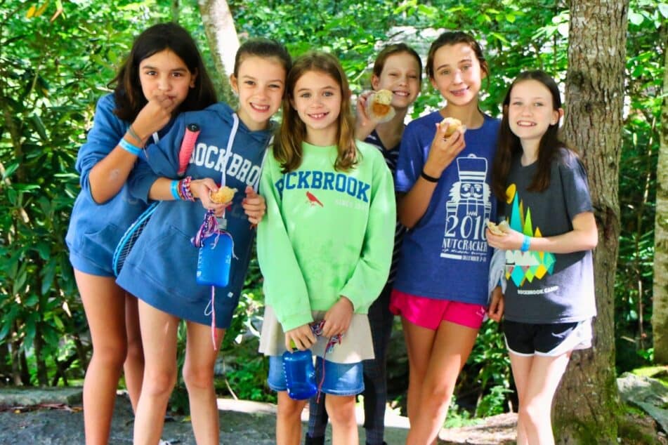 girls eating camp muffins