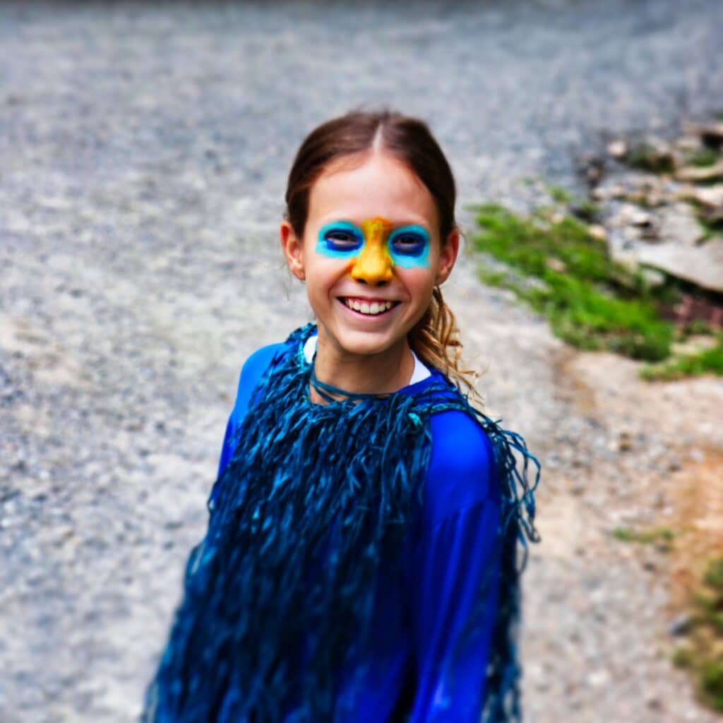 girl wearing bird costume