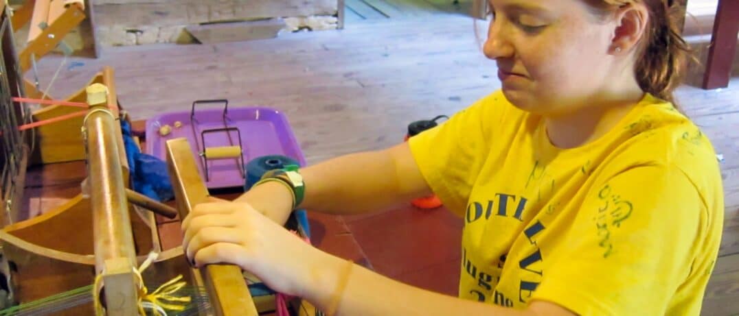 girls doing fiber arts at camp