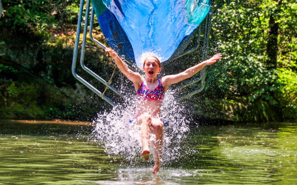 girl camp water slide splash