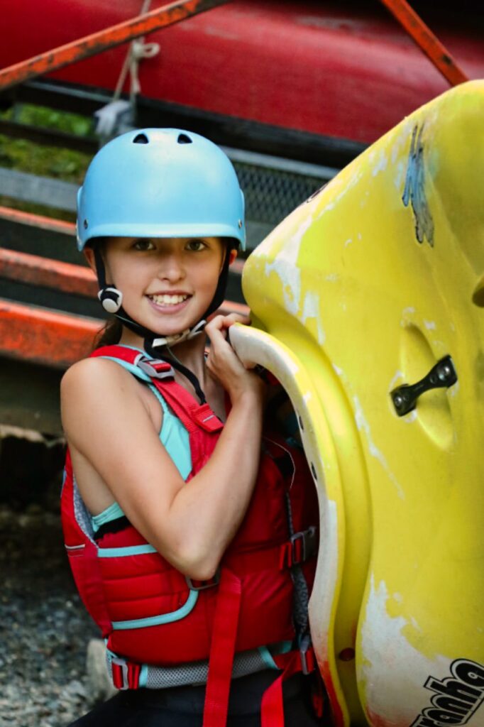 strong camp kayaker girl