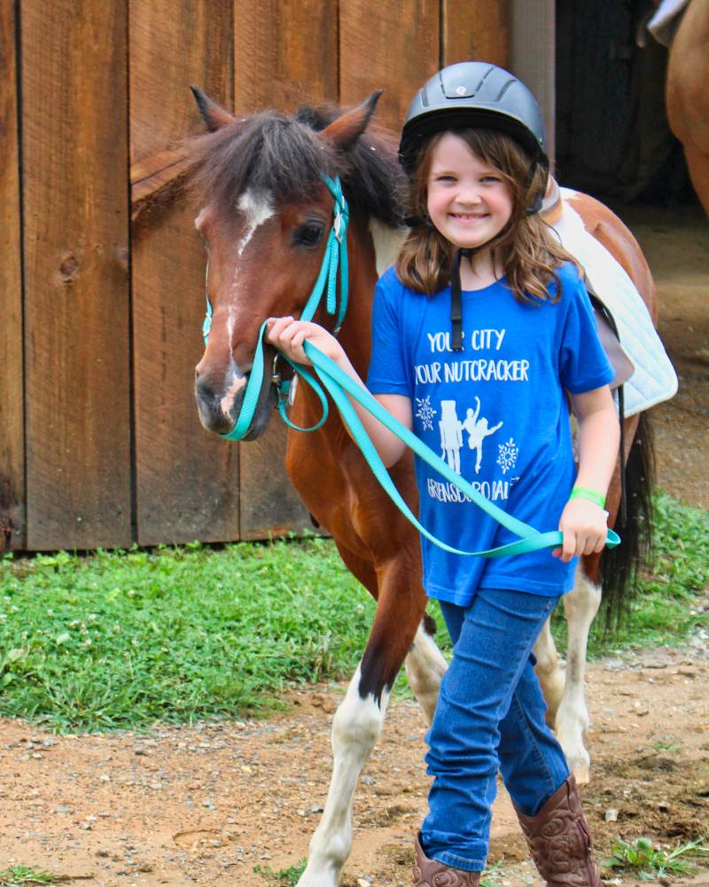 small kid and small pony