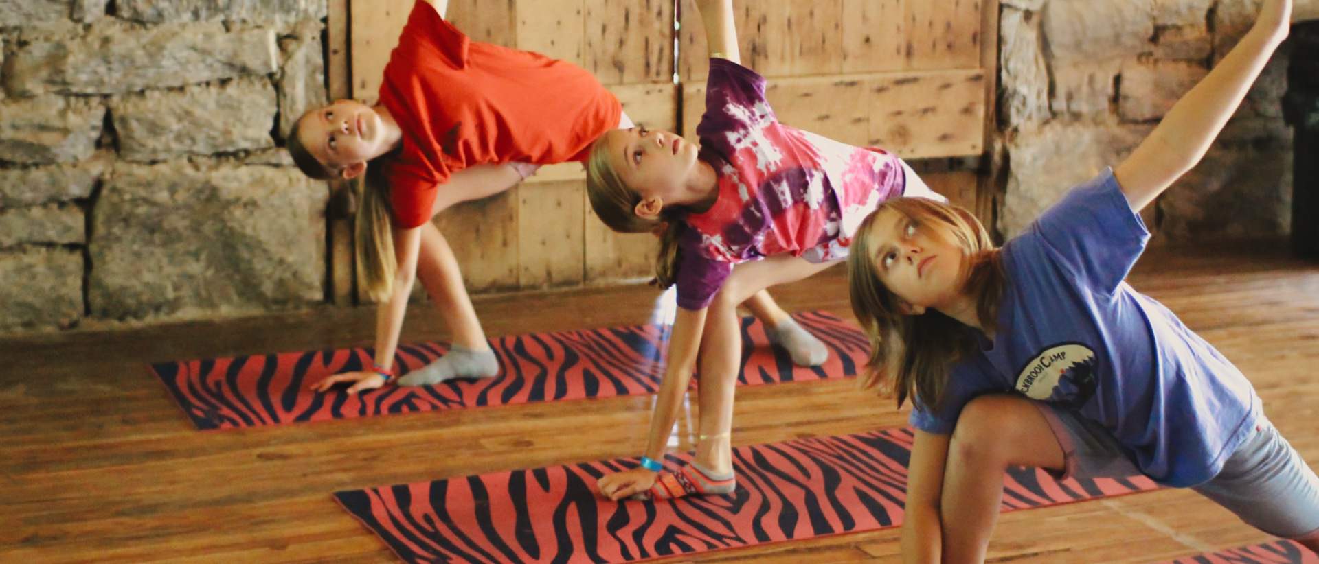 camp girls doing yoga