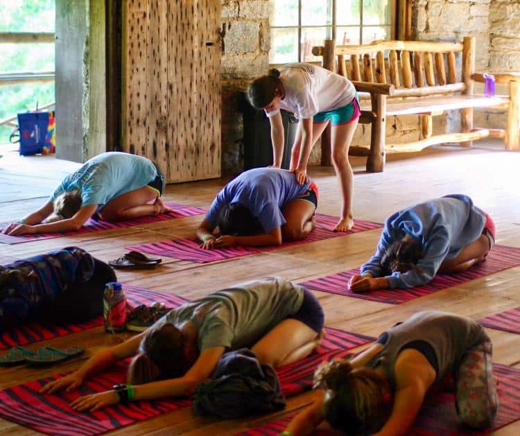 camp group stretching in yoga class