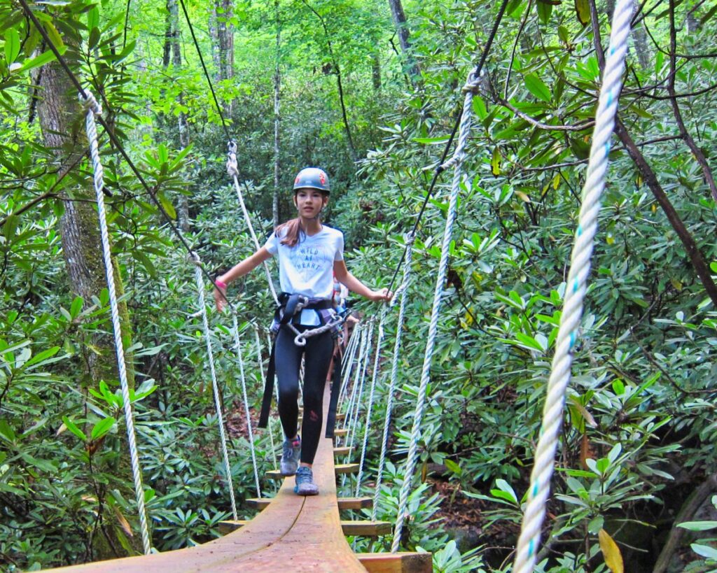 zip line bridge with camp girl