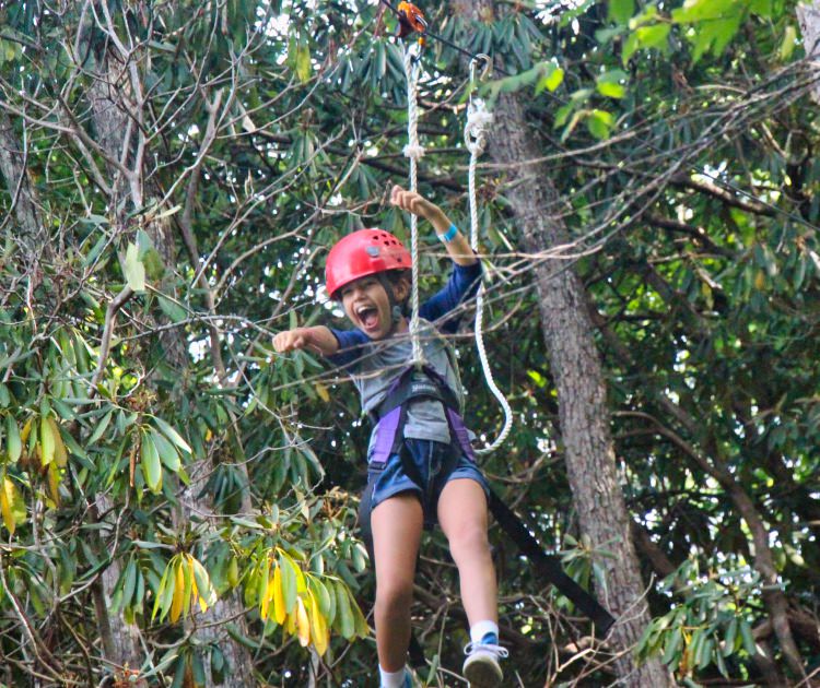 thrilled zipline camp girl