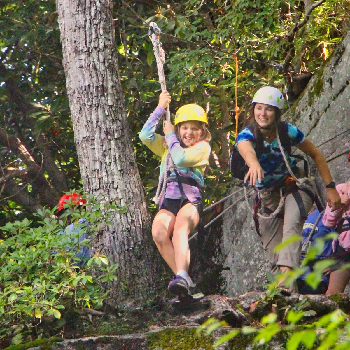 camp kid being launched on zipline