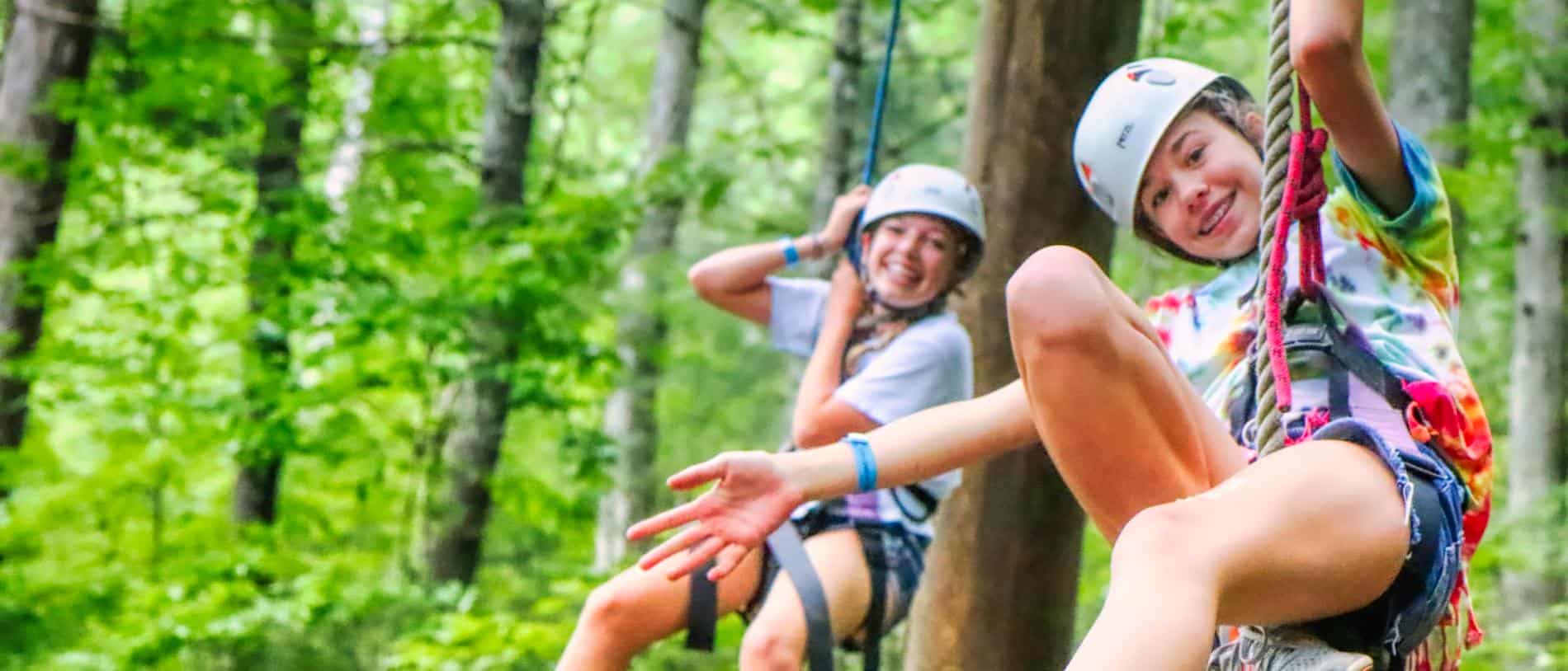 North Carolina camp girls climbing on ropes
