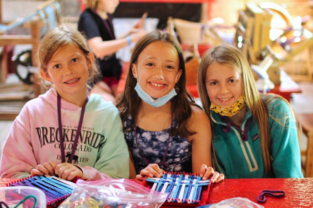 crafty camp girls finger weaving