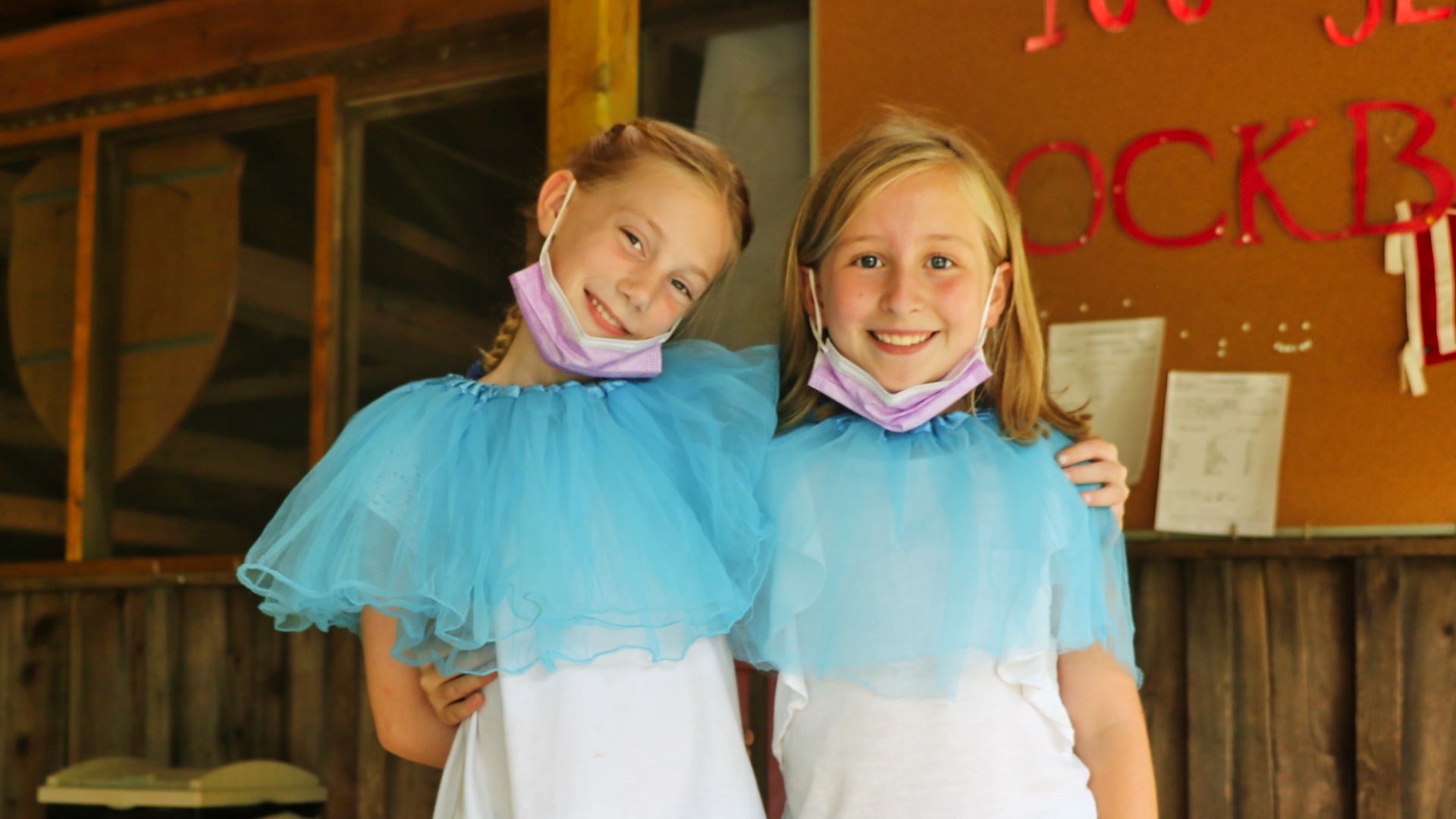 camp girls dressed as twins