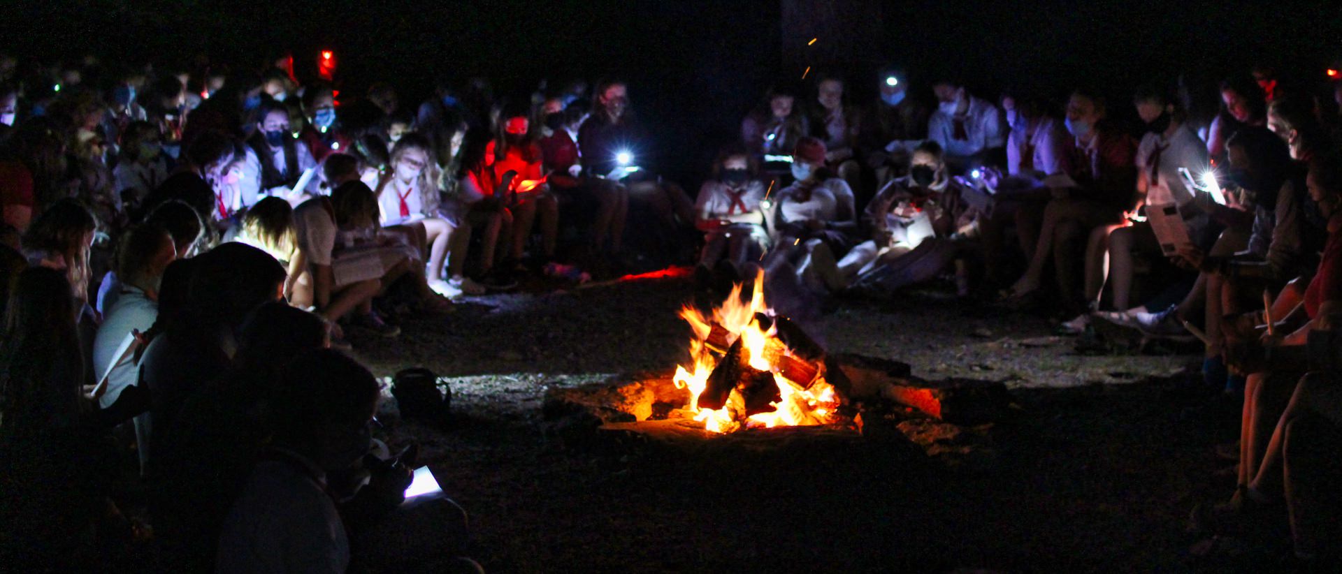 summer camp closing campfire
