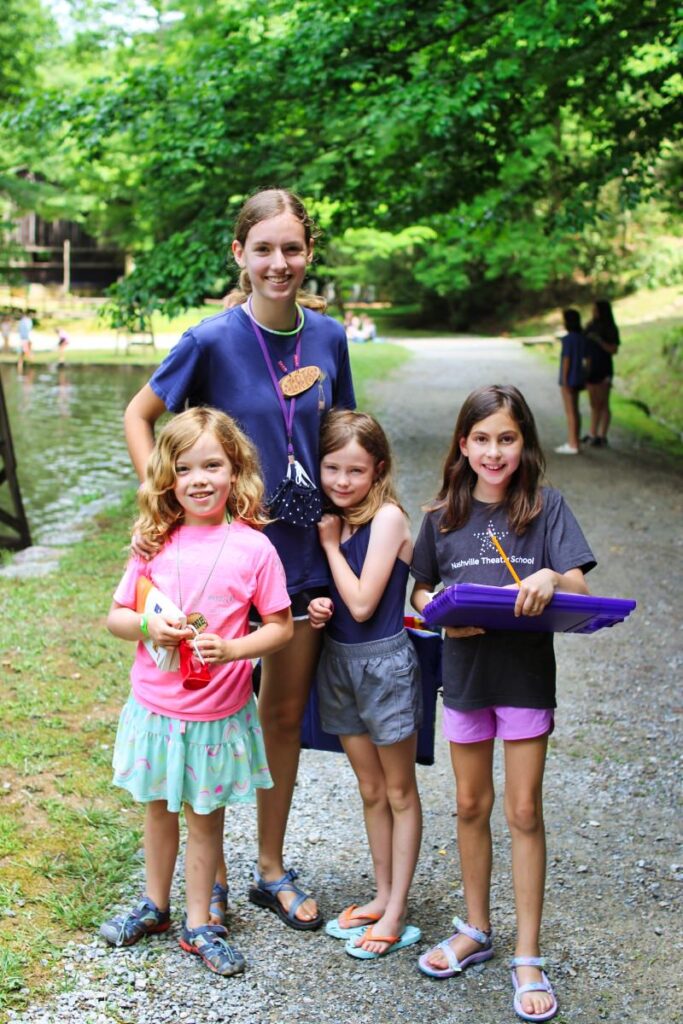 camp counselor with children