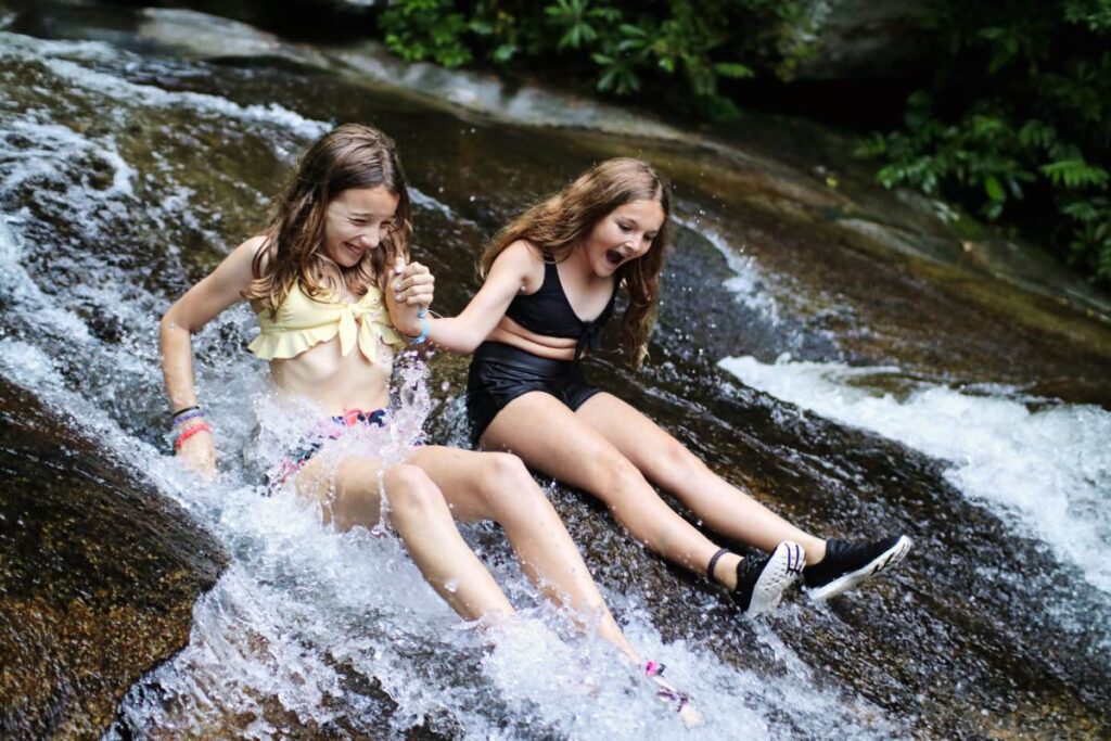 sliding rock in NC cheering girls