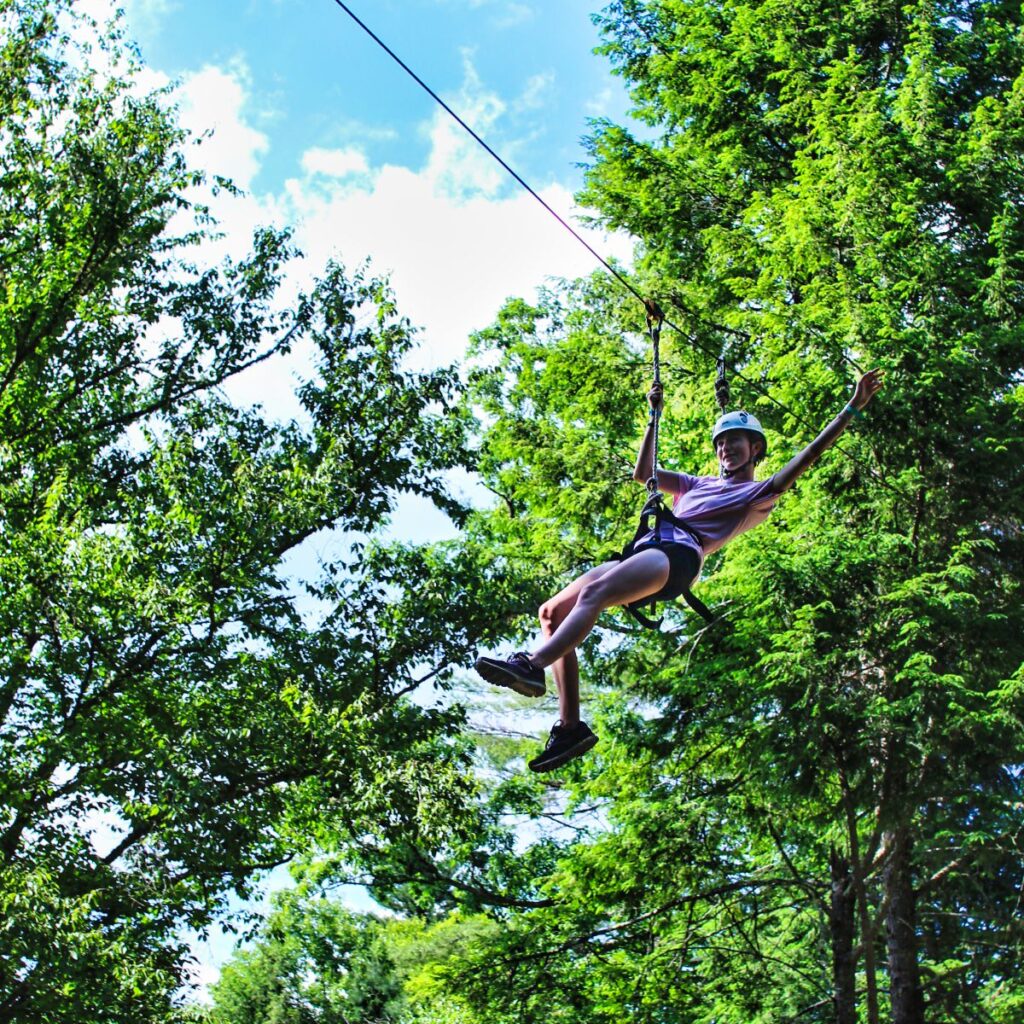 high-flying camp zipline girl