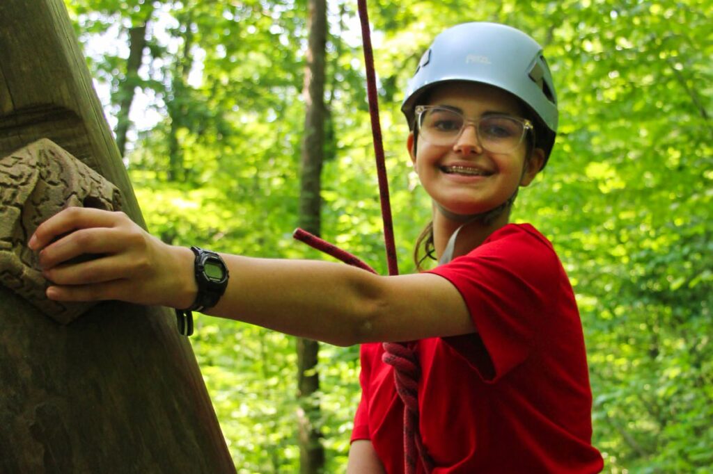 caamp girl on adventure climb