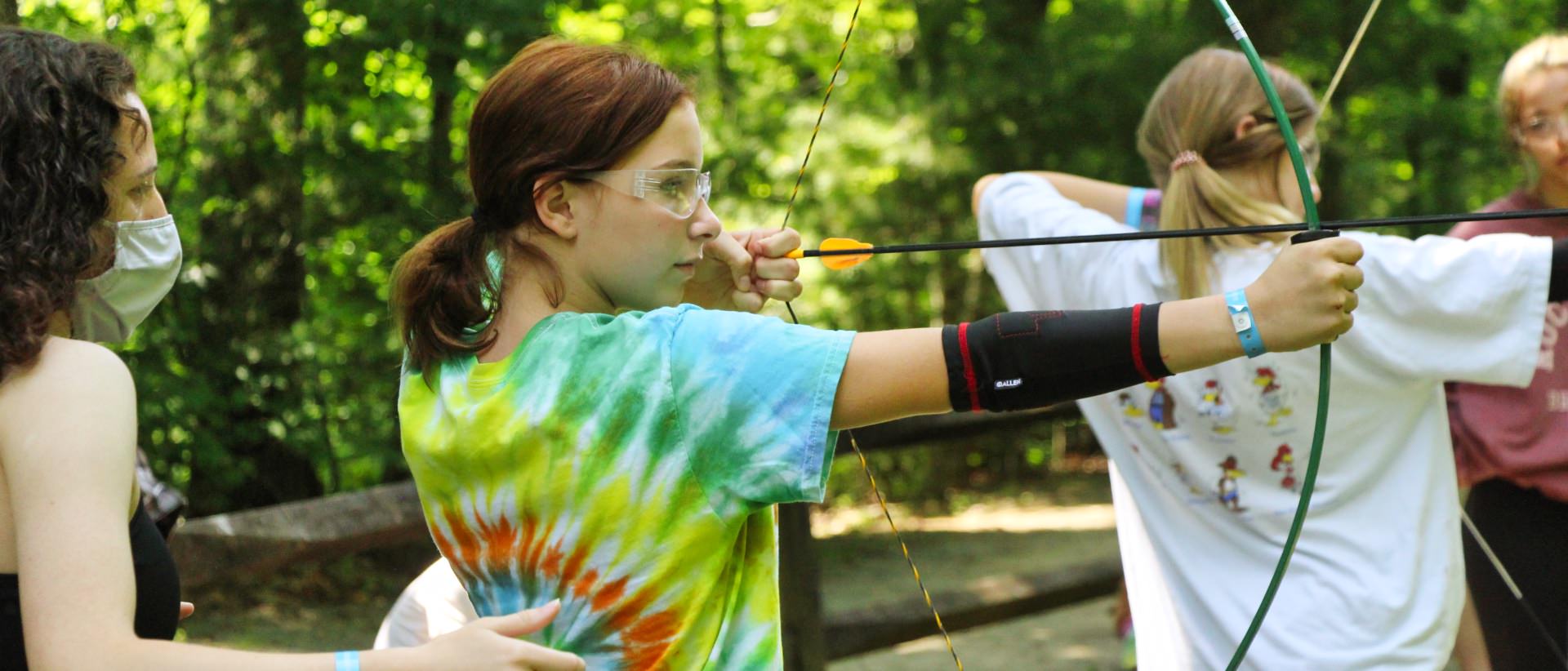 kid training in archery