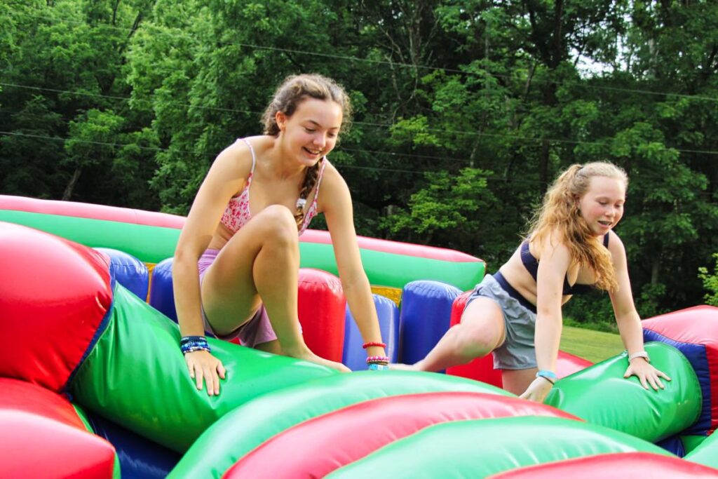 girls racing through carnival course