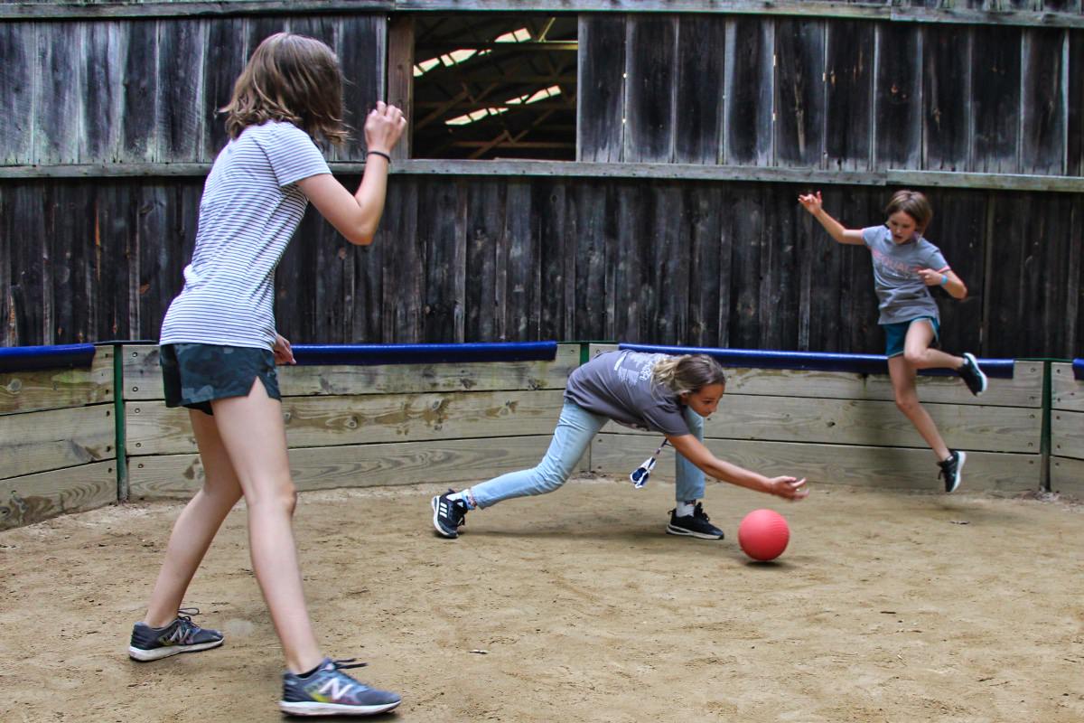 Girls playing a gaga ball game