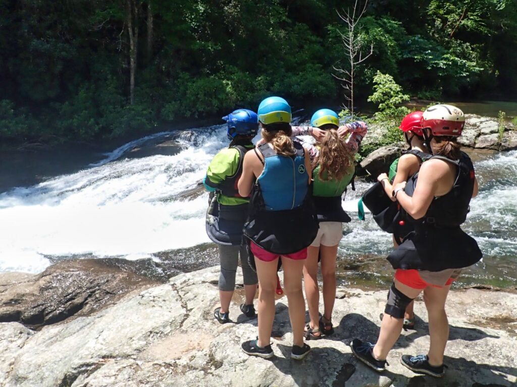 girls scouting whitewater rapid